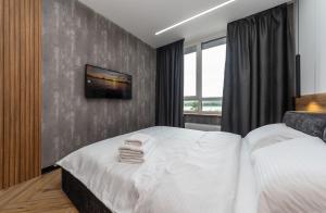 Posteľ alebo postele v izbe v ubytovaní Luxury apartments GREAT