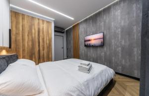 Posteľ alebo postele v izbe v ubytovaní Luxury apartments GREAT