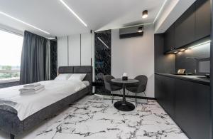 Posteľ alebo postele v izbe v ubytovaní Luxury apartments GREAT