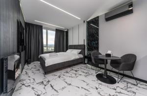 Posteľ alebo postele v izbe v ubytovaní Luxury apartments GREAT