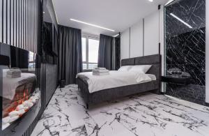 Posteľ alebo postele v izbe v ubytovaní Luxury apartments GREAT