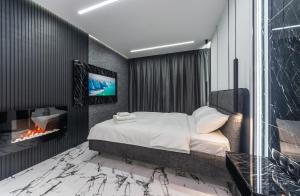Posteľ alebo postele v izbe v ubytovaní Luxury apartments GREAT