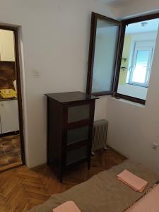 Una cama o camas en una habitación de Mira i Ola Apartman 8 fotos más