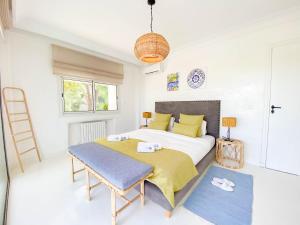 Rúm í herbergi á Villa Punique: Villa exceptionnelle avec vue mer