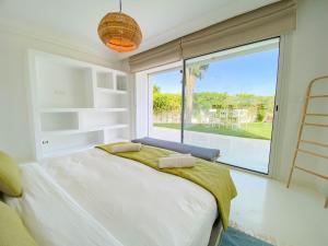 Rúm í herbergi á Villa Punique: Villa exceptionnelle avec vue mer