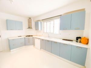 Eldhús eða eldhúskrókur á Villa Punique: Villa exceptionnelle avec vue mer