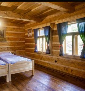 Postel nebo postele na pokoji v ubytování Chalupy Pod Šenkem - Výminek