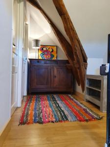 Postel nebo postele na pokoji v ubytování Gite de Charme Gite du Hameau