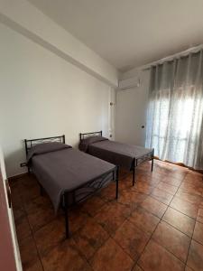 Postel nebo postele na pokoji v ubytování BedGodini