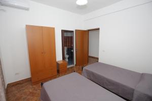Postel nebo postele na pokoji v ubytování BedGodini
