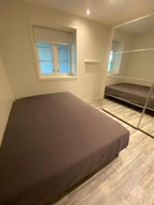 En eller flere senge i et værelse på Bredbuktnes