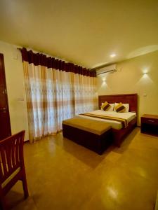 Afbeelding uit fotogalerij van Woodnest Villa Rustic in Kochchikade +54 foto's