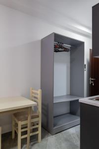 Kuchyň nebo kuchyňský kout v ubytování Rest Hour Hotel