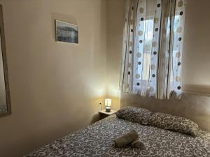 Postel nebo postele na pokoji v ubytování Vila Razic