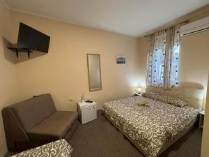 Postel nebo postele na pokoji v ubytování Vila Razic