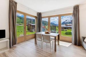 Фотография из галереи Chalet Snowlake Appartamento Lago в Ливиньо