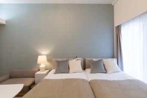 En eller flere senge i et værelse på Primavera Namba Minami + 61 billeder