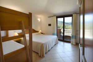 Ένα ή περισσότερα κρεβάτια σε δωμάτιο στο Le Anfore Hotel +111 φωτογραφίες