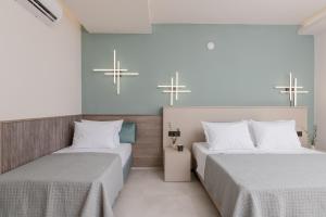 Voodi või voodid majutusasutuse Hera Zakynthos Hotel toas
