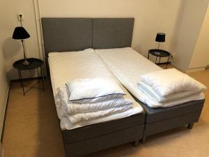 Postel nebo postele na pokoji v ubytování Vandrarhemmet Eken