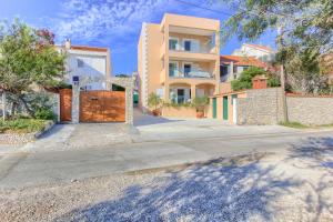 an empty street with a house in the background at Villa ARIJANA - LAVANDA in Slatine