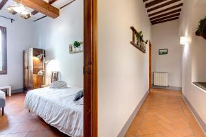Posteľ alebo postele v izbe v ubytovaní Zeno Apartment by Mamo Florence