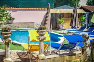 Bazén v ubytování Giovanna Boutique Rooms & Pool nebo v jeho okolí