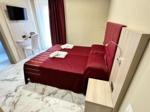 Postel nebo postele na pokoji v ubytování Pasitea B&B