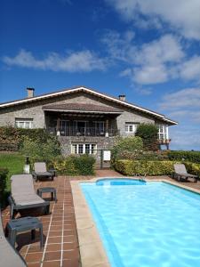 Bazén v ubytování Hotel Los Caspios nebo v jeho okolí