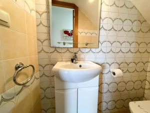 Łazienka w obiekcie Apartamentos O Grove 3000