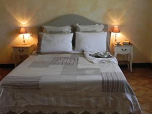 Agriturismo Sugheretello客房内的一张或多张床位