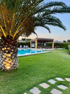 Bazén v ubytování Possidi Hiliadou Boutique Resort nebo v jeho okolí