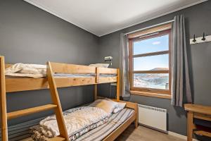 Postel nebo postele na pokoji v ubytování Voss Resort self-catered apartments