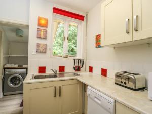 Η κουζίνα ή μικρή κουζίνα στο Garden Cottage +17 φωτογραφίες