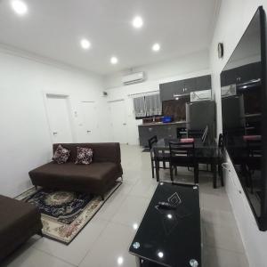 Posezení v ubytování Gounders Apartmemt