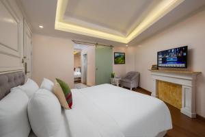 TV a/nebo společenská místnost v ubytování Sapa Praha Hotel