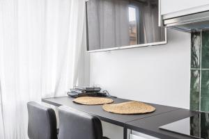 kuchnia z blatem z dwoma kapeluszami w obiekcie GuestReady - Mini studio tout équipé aux Chartrons w mieście Bordeaux +15 zdjęć