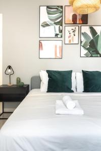 Ein Bett oder Betten in einem Zimmer der Unterkunft GuestReady Holiday Homes - Light Abode