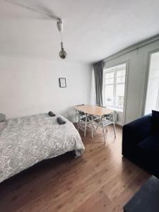 Ένα ή περισσότερα κρεβάτια σε δωμάτιο στο Perfect for your stay in Old Town of Stockholm