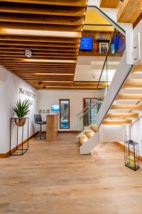 an office with stairs and a desk in a building at The Victoria Hotel & Source Spa in Sidmouth