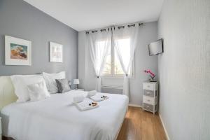 Ένα ή περισσότερα κρεβάτια σε δωμάτιο στο GuestReady - Calme et très beau T2 Part-Dieu