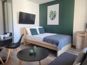 Posteľ alebo postele v izbe v ubytovaní Apartamenty Portowe Westerplatte 19