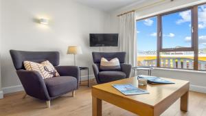 Posezení v ubytování Clifden River View Apartment