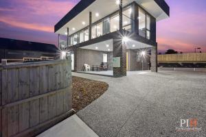 a house with a fence in front of it at Panoramic Paradise 4-BR San Remo in San Remo +22 photos