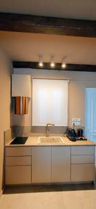 A kitchen or kitchenette at Locanda
