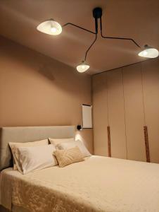A bed or beds in a room at Locanda