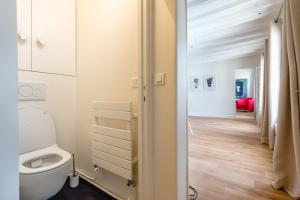 Posteľ alebo postele v izbe v ubytovaní GuestReady - Estadia tranquila em Le Marais