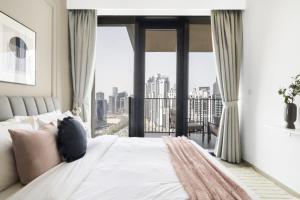 Ліжко або ліжка в номері GuestReady - Magnificent heart of Downtown