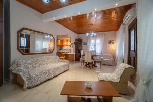 Giường trong phòng chung tại Ocean View Oasis - Palaiokastritsa