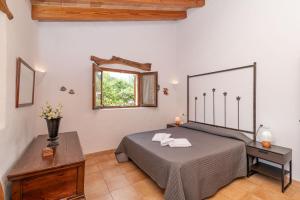 Posteľ alebo postele v izbe v ubytovaní Villa Cal Beato by Sealand Villas
